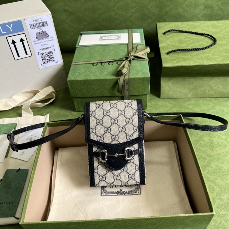 G*u*i satchel bags